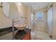 Modern bathroom showcasing a unique stone sink, and a glass enclosed shower at 10125 Quarry Hill Pl, Parker, CO 80134