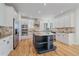 Beautiful kitchen with stainless steel appliances and a center island at 10125 Quarry Hill Pl, Parker, CO 80134