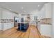 Modern kitchen features stainless appliances and a granite topped center island at 10125 Quarry Hill Pl, Parker, CO 80134