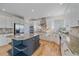 Well-lit kitchen with granite countertops and stainless steel appliances at 10125 Quarry Hill Pl, Parker, CO 80134