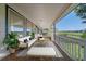 Covered patio with outdoor seating offering scenic views and a place to relax at 10125 Quarry Hill Pl, Parker, CO 80134