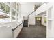 A spacious entryway features high ceilings and windows with views of the forest at 10508 Christopher Dr, Conifer, CO 80433
