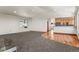 Bright living room featuring an open floor plan, view windows and modern finishes at 10508 Christopher Dr, Conifer, CO 80433