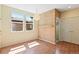 Sun-filled dining room with wood floors, a decorative light fixture, and ample space for entertaining at 8335 E 22Nd Ave, Denver, CO 80238