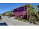 Two-story home with solar panels, garage, and landscaped yard in a residential area at 8335 E 22Nd Ave, Denver, CO 80238