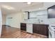 Modern kitchen with stainless steel appliances and beautiful backsplash at 13691 E Marina Dr # 107, Aurora, CO 80014