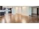 Open-concept living and kitchen area with modern cabinetry and stainless steel appliances, creating a bright and airy space at 13691 E Marina Dr # 107, Aurora, CO 80014