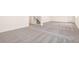 Finished basement showcasing neutral carpet, offering a versatile space with a staircase and room for various activities at 2177 Garden Ave, Brighton, CO 80601