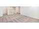 Upstairs carpeted hallway offering neutral, light-colored carpet and white trim at 2177 Garden Ave, Brighton, CO 80601