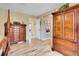 Spacious bedroom with wood floors, large wardrobes, and ensuite bathroom access at 19447 E Bellisario Creek Dr, Parker, CO 80134