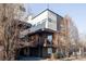 Townhome boasts modern architecture with multi-level balconies and mixed material facade at 3619 Navajo St, Denver, CO 80211