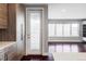 Modern kitchen with a door leading to a private balcony at 3619 Navajo St, Denver, CO 80211