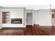 Bright living room featuring a fireplace and hardwood floors at 3619 Navajo St, Denver, CO 80211