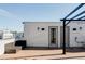 Private rooftop deck boasts a pergola and city views at 3619 Navajo St, Denver, CO 80211