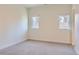 Spacious bedroom with neutral walls and carpeted floors at 2951 E Evans Ave, Denver, CO 80210