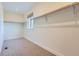 Large walk-in closet with ample shelving and natural light at 2951 E Evans Ave, Denver, CO 80210