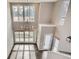 High-ceiling entryway with large windows and elegant chandelier at 2951 E Evans Ave, Denver, CO 80210