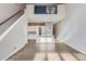 Open concept kitchen with white cabinets and island at 2951 E Evans Ave, Denver, CO 80210