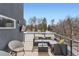 Relaxing rooftop deck features sectional sofa, chairs, and city views at 2951 E Evans Ave, Denver, CO 80210