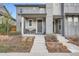 Inviting front porch with seating and modern landscaping at 8157 E 53Rd Dr, Denver, CO 80238