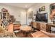 Cozy living room featuring modern furnishings and stylish décor at 8157 E 53Rd Dr, Denver, CO 80238