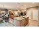 Spacious kitchen and living area with modern appliances and stylish furnishings at 8157 E 53Rd Dr, Denver, CO 80238