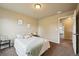 Bedroom featuring neutral walls, carpeted floors, and minimal decorations at 443 Hermosa St, Brighton, CO 80603