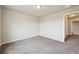 This bedroom offers a neutral color scheme with carpet flooring at 443 Hermosa St, Brighton, CO 80603