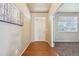 Inviting entryway with hardwood floors and view into the office at 443 Hermosa St, Brighton, CO 80603