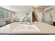 Open concept kitchen featuring stainless steel sink and view of the living area at 443 Hermosa St, Brighton, CO 80603