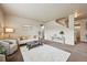 Bright living room with neutral decor, a plush rug, and stylish furnishings at 443 Hermosa St, Brighton, CO 80603