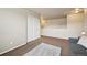 Loft area with carpeted floors and plenty of natural light at 443 Hermosa St, Brighton, CO 80603
