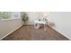 Cozy office space with a window and neutral carpeting at 443 Hermosa St, Brighton, CO 80603