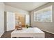 Bright office with white desk, globe, and double doors to an adjacent space at 443 Hermosa St, Brighton, CO 80603