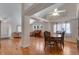 Inviting dining area with hardwood floors, vaulted ceiling and open to the living spaces at 3563 Watada Dr, Brighton, CO 80601