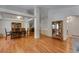 Elegant dining room featuring hardwood floors, and open to the living spaces at 3563 Watada Dr, Brighton, CO 80601