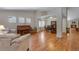 Spacious living room with hardwood floors, ample natural light, and open floor plan at 3563 Watada Dr, Brighton, CO 80601