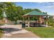 Community picnic area with covered pavilion and park amenities at 3563 Watada Dr, Brighton, CO 80601