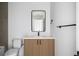 Modern bathroom with a sleek vanity, contemporary fixtures, and a minimalist design at 5031 Moss Pl, Golden, CO 80403