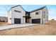 Modern two-story home featuring a two-car garage and a contemporary design on a large lot at 5031 Moss Pl, Golden, CO 80403