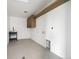 Clean laundry room with sink, storage cabinet, and hookups for washer and dryer at 5031 Moss Pl, Golden, CO 80403