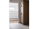 Pantry with built-in wooden shelves and a spacious storage cabinet at 5031 Moss Pl, Golden, CO 80403