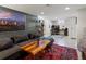Finished basement with a living area, a study area, and recessed lighting at 3401 N Steele St, Denver, CO 80205