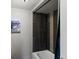 Tiled shower over tub in a modern bathroom at 3401 N Steele St, Denver, CO 80205