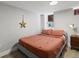 Simple bedroom featuring a comfortable bed, warm lighting, and cozy area rug at 3401 N Steele St, Denver, CO 80205