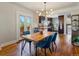 Dining room showing access to kitchen and back deck at 3401 N Steele St, Denver, CO 80205