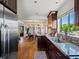 View of kitchen, dining room, and living room in an open floor plan at 3401 N Steele St, Denver, CO 80205