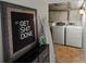 Efficient laundry room with modern washer and dryer units at 3401 N Steele St, Denver, CO 80205