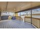 Spacious, covered back deck perfect for outdoor living, entertaining, and enjoying beautiful views from your home at 3440 Chase St, Wheat Ridge, CO 80212