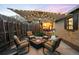 Charming backyard patio with a fire pit, string lights, and outdoor seating at 1918 S Lincoln St, Denver, CO 80210